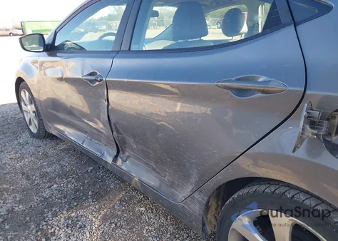 2012 Hyundai Elantra Limited z USA, uszkodzony, nr VIN 5NPDH4AE9CH090431